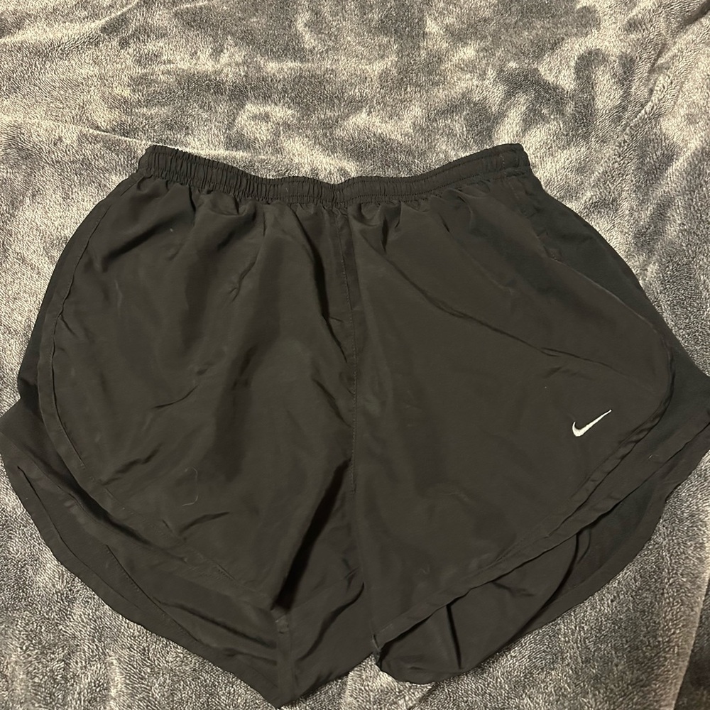 Black Nike running shorts